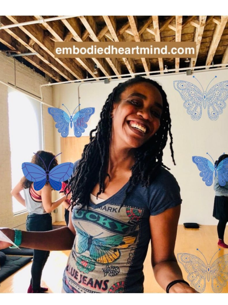 Picture of Lissa smiling to point off camera